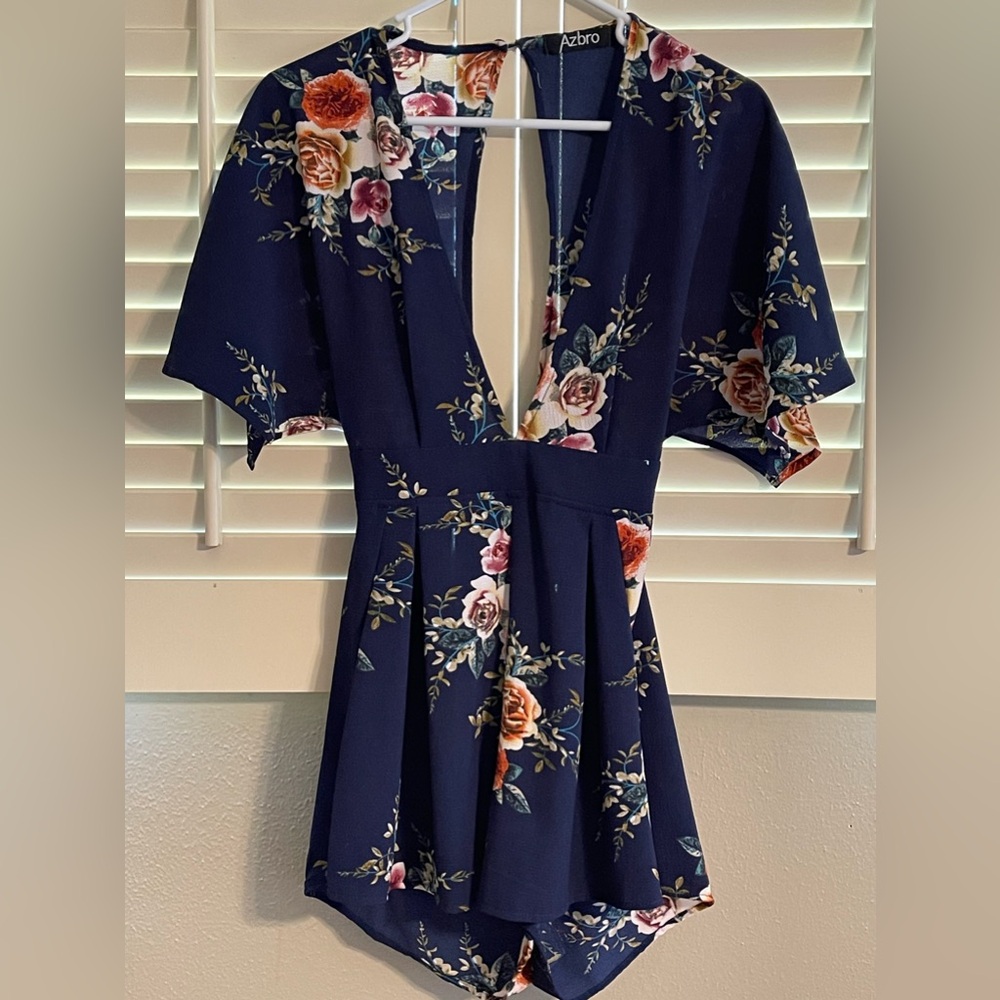 Sexy romper! Navy floral with deep V front and back. Perfect condition! Size S